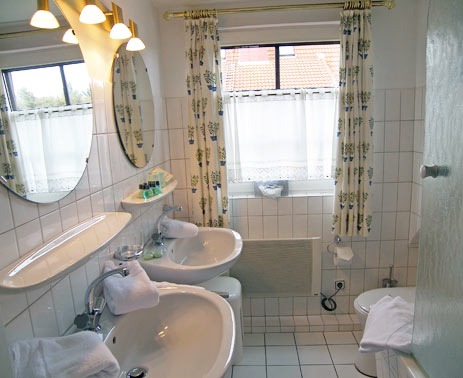 Vacation apartment C1 Hotel Sylter Hahn in Westerland bathroom double sink