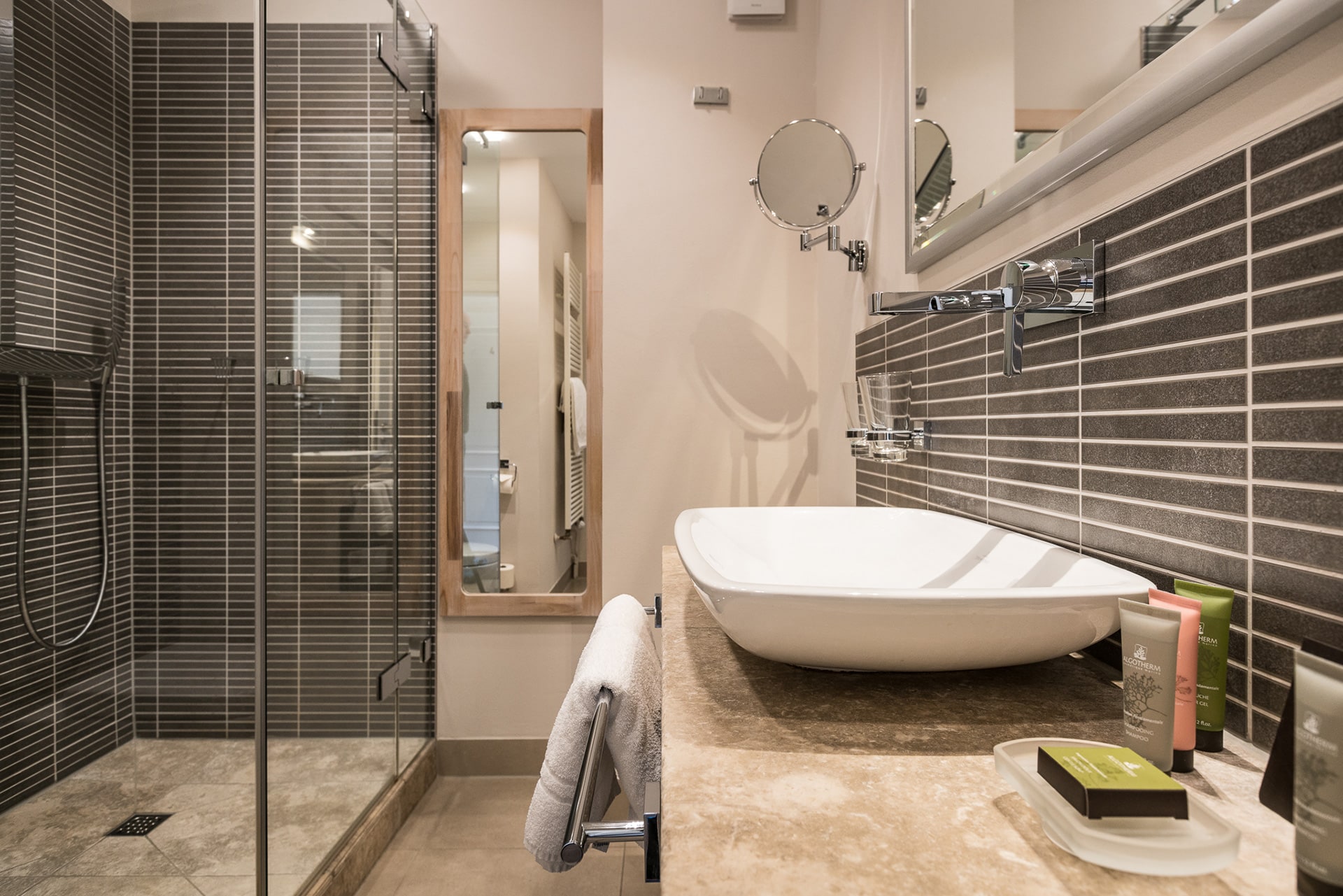 bathrom in double room hotel sylter hahn westerland with big shower and mirror clean