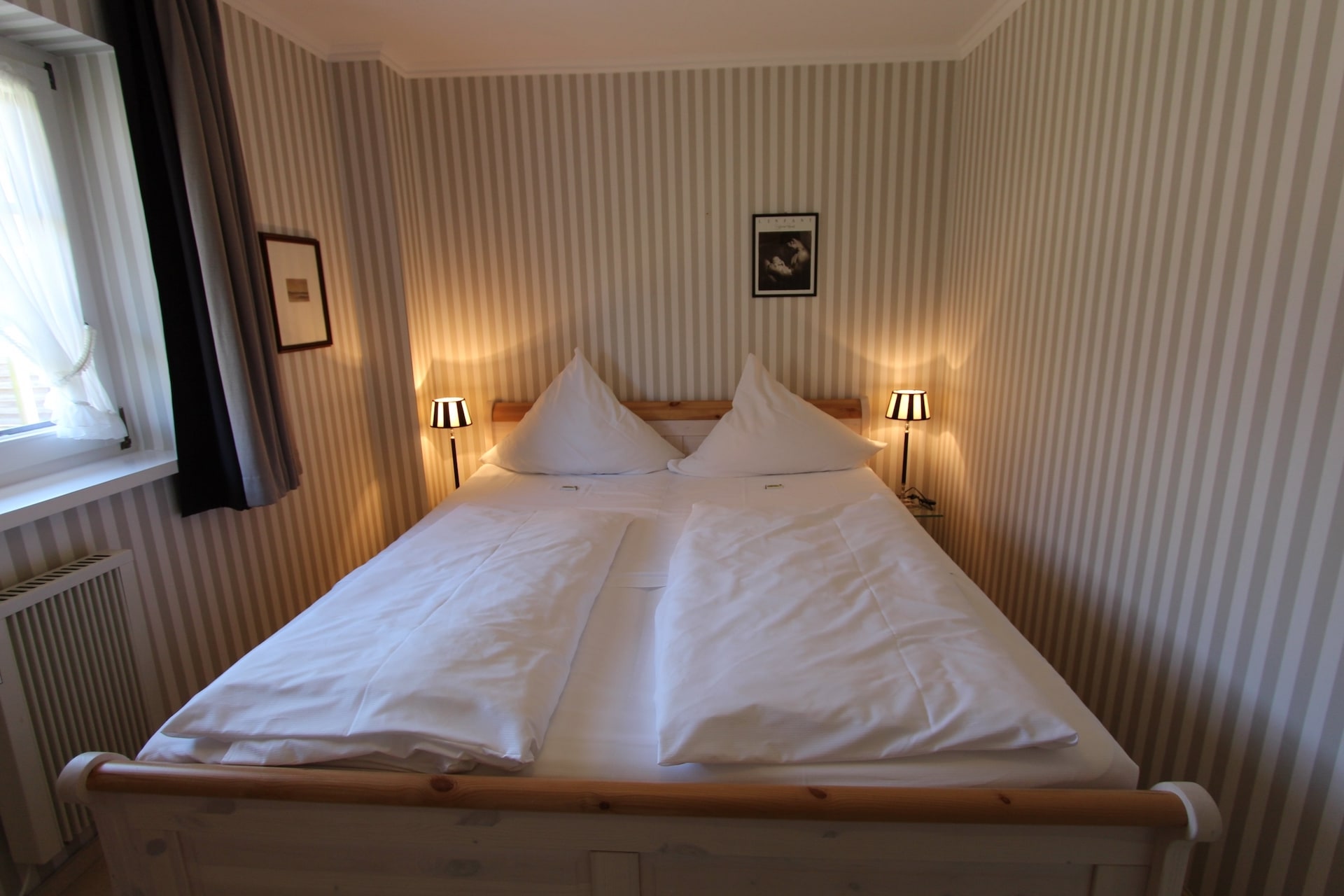 Schlafzimmer in der Ferienwohnung B1 im Hotel Sylter Hahn in Westerland auf Sylt