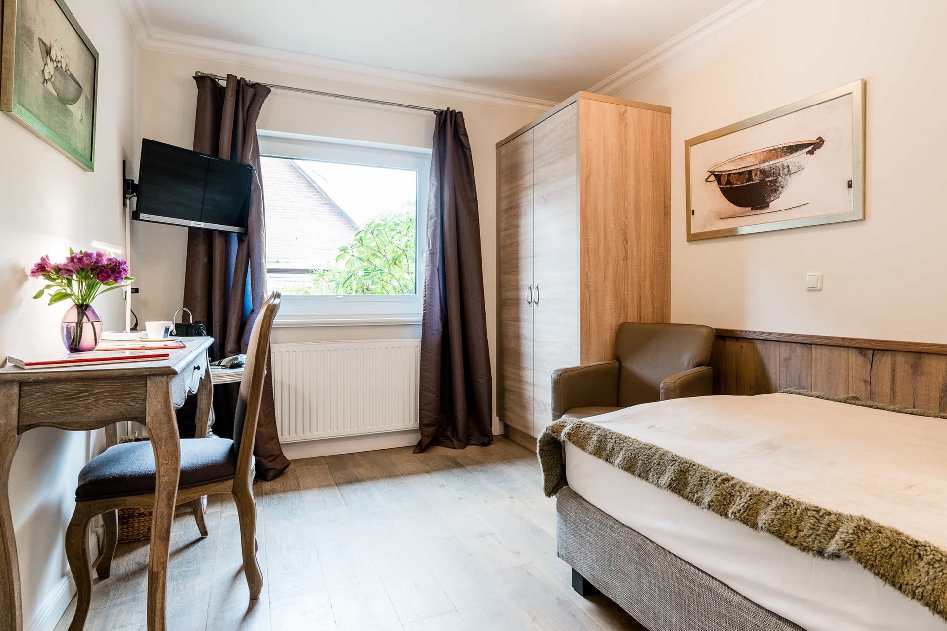 Einzelzimmer mit Einzelbett im Hotel Sylter Hahn in Westerland auf Sylt