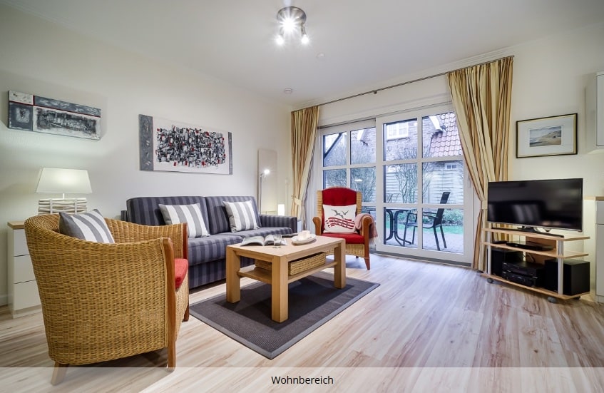 Wohnzimmer in der Ferienwohnung C1 mit Terrasse in Westerland auf Sylt