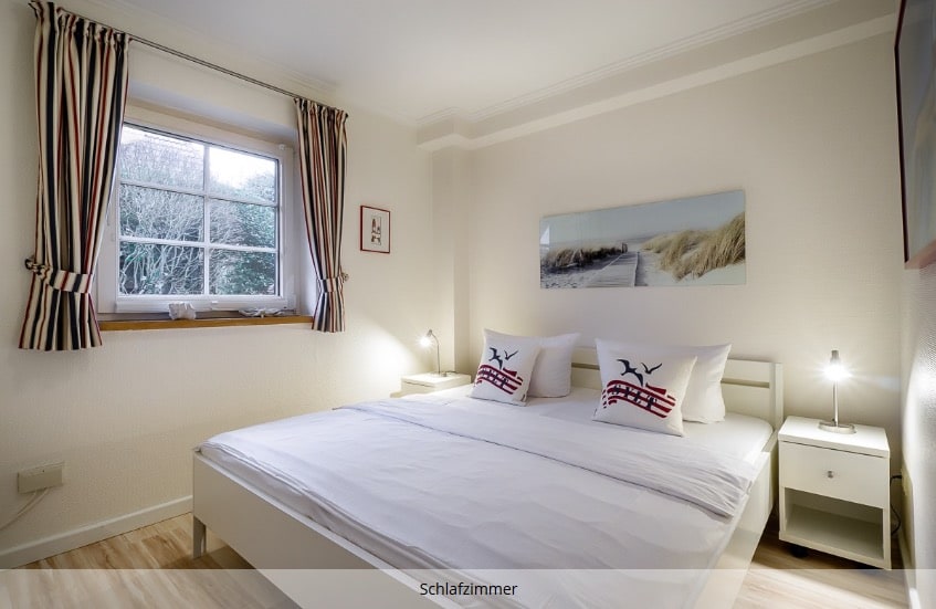 Schlafzimmer in der Ferienwohnung C1 mit Terrasse in Westerland auf Sylt